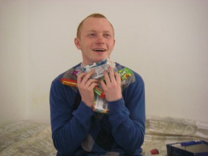 Elder Payne expressing thanks at the gifts of his birthday candies.